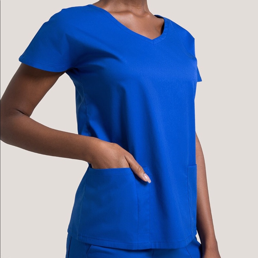 Scrub top size medium new with tags. Jaannu